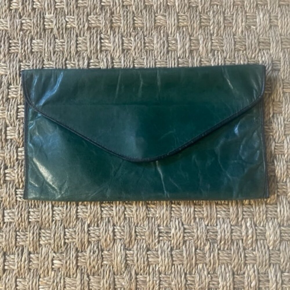 Sarlat Paris vegetable tanned leather envelope clutch bag in green